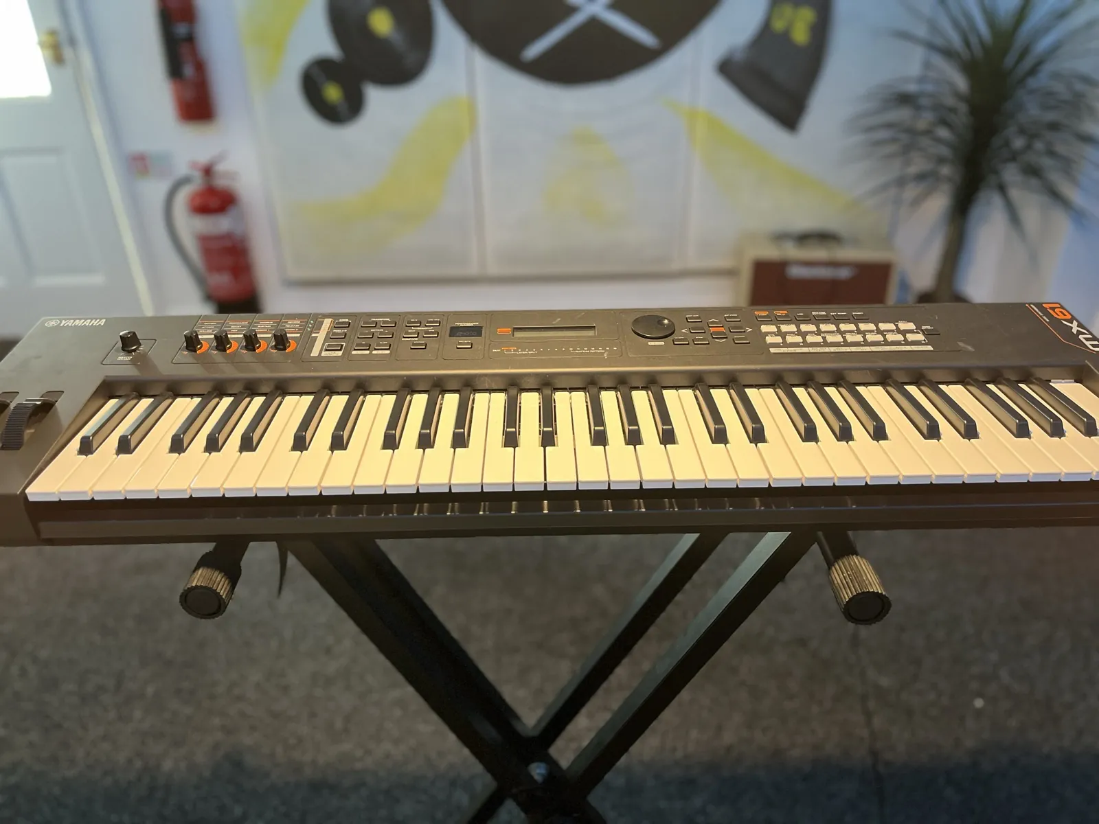 The Yamaha MX61 on its stand.