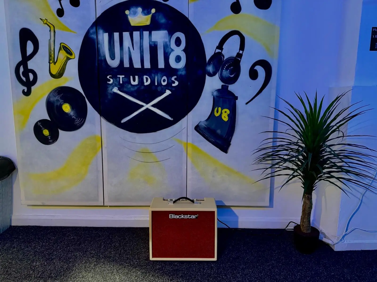 Amplifier and feature wall inside Unit 8 Studios